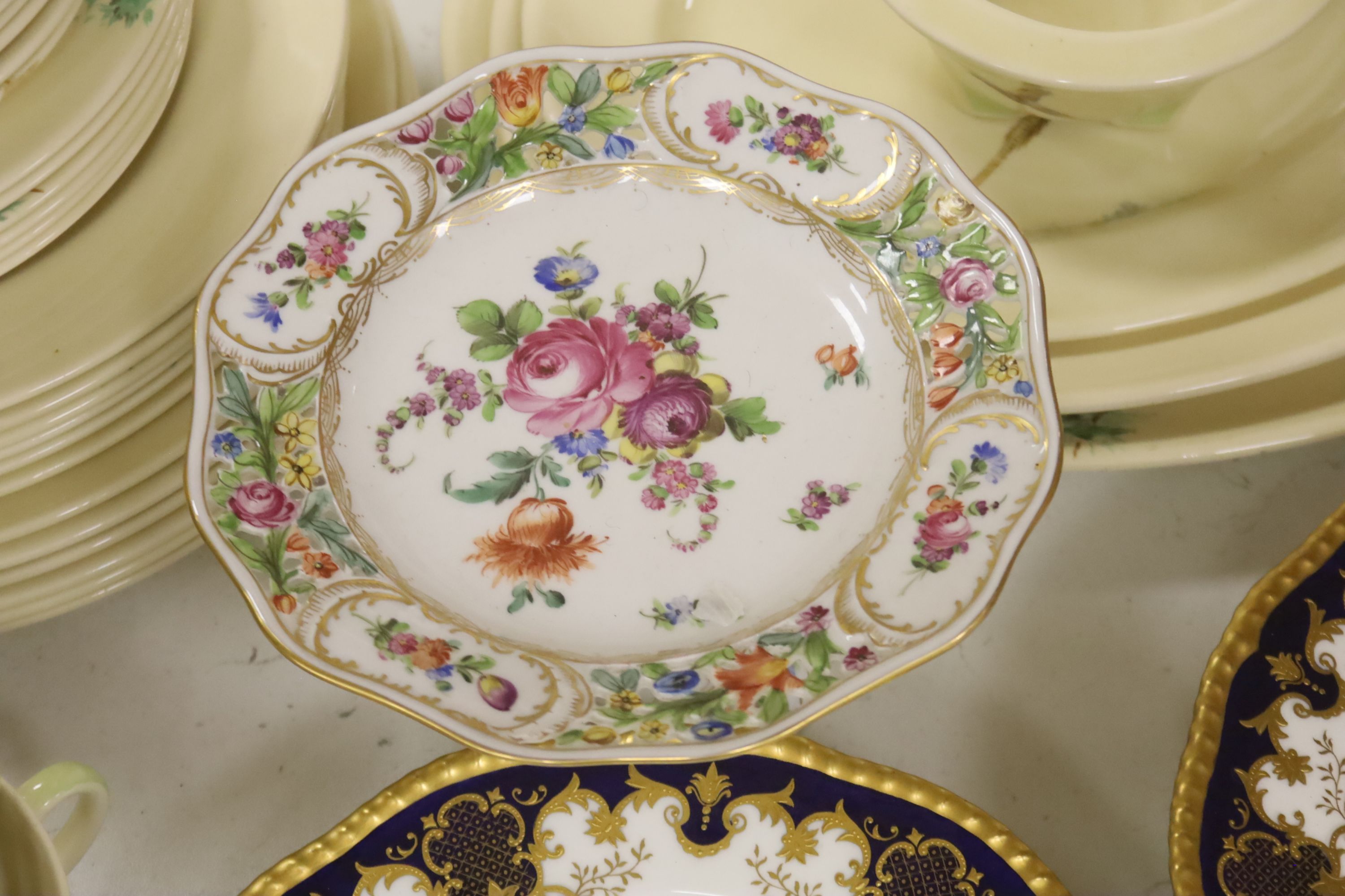 A set of six Coalport game bird plated plates and a Royal Doulton 'The Coppice' pattern part dinner service